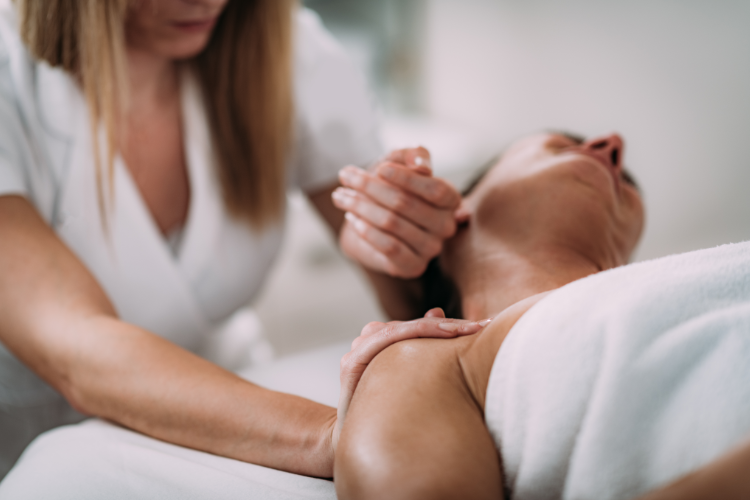 Physical+therapist+treating+shoulder+pain+through+manual+therapy+techniques